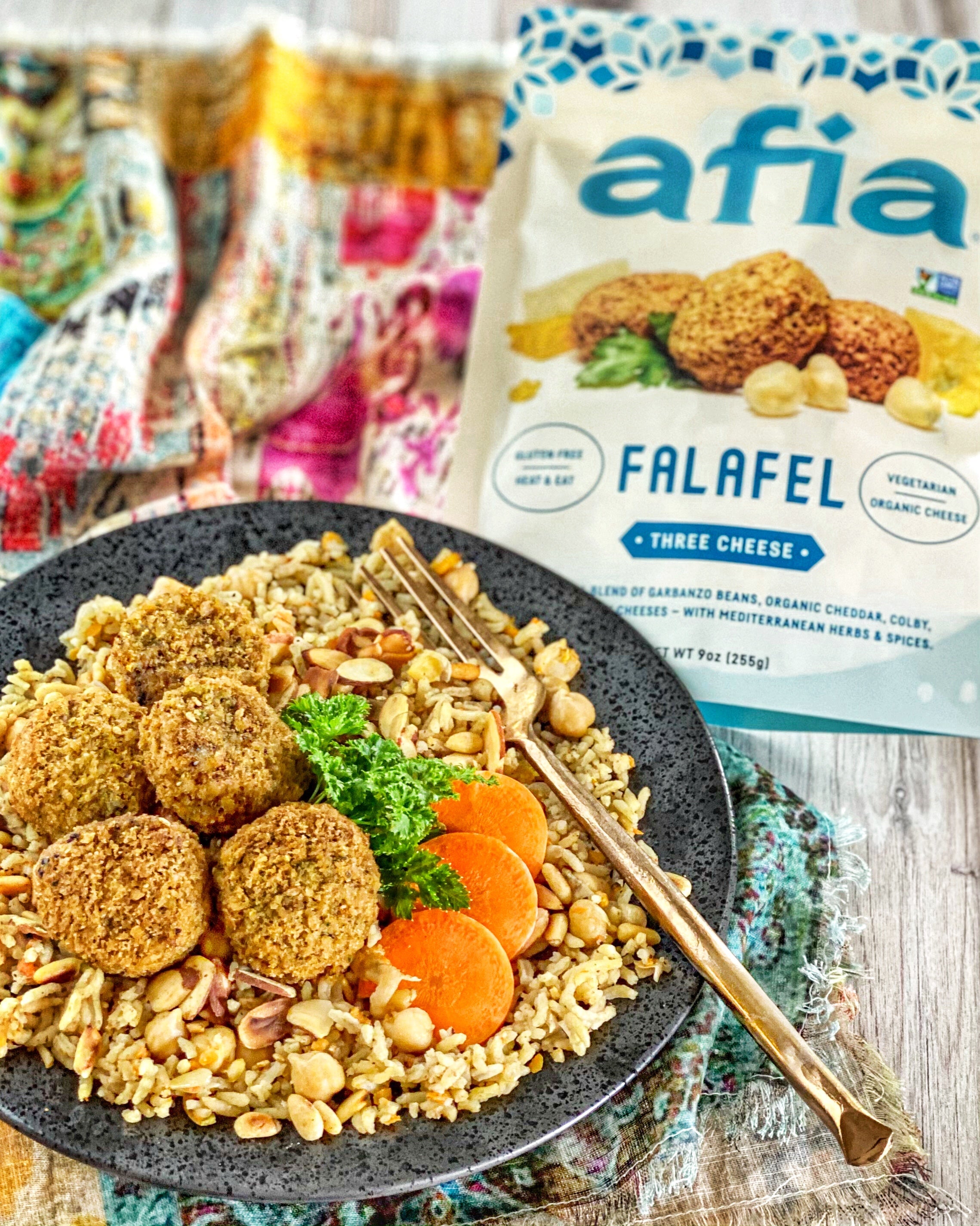 Freekeh grain bowl featuring Afia 3 cheese falafel. 