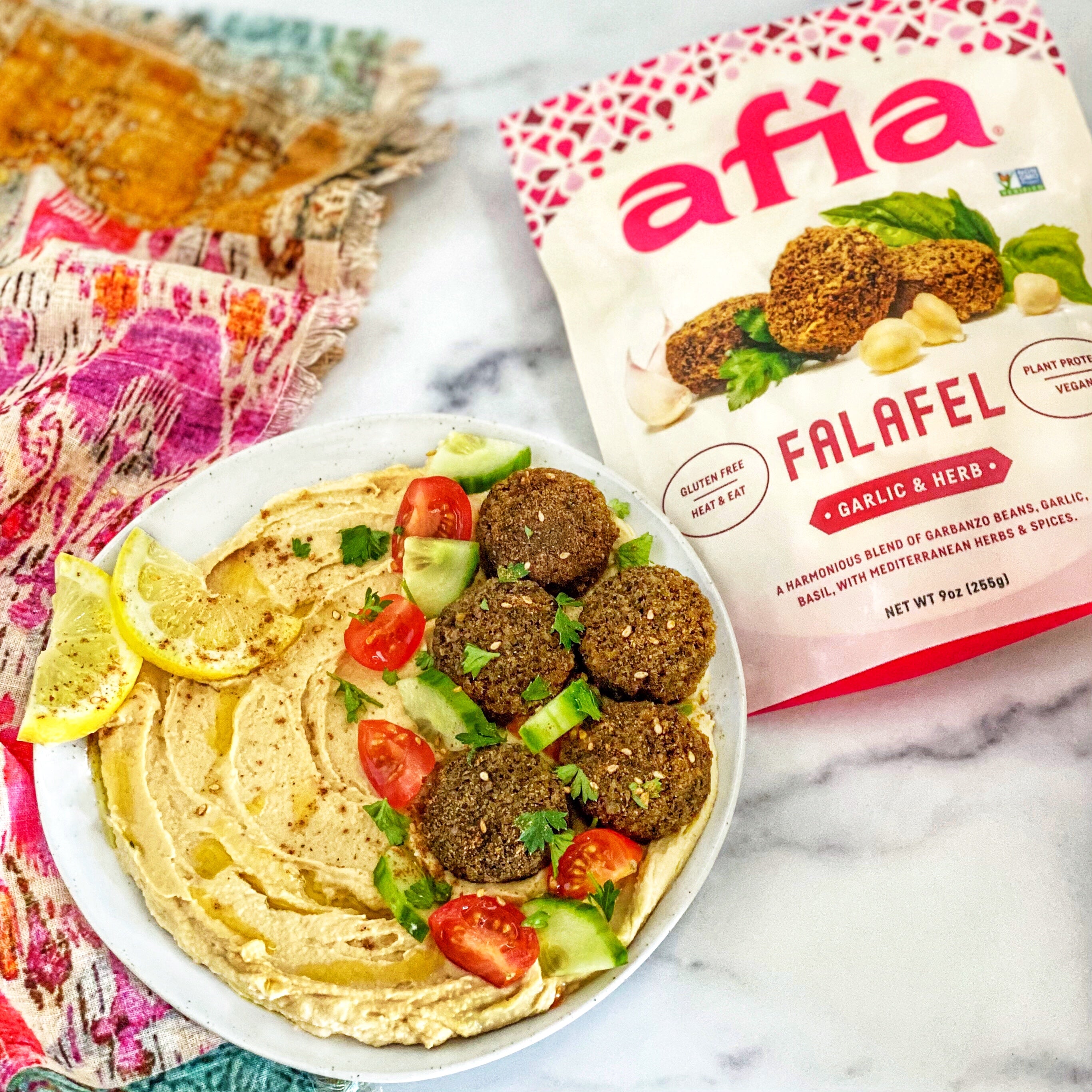 White Bean Hummus with Pesto and Afia Falafel