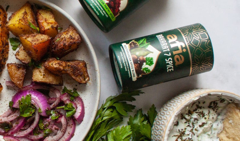 Roasted Potatoes made with Afia Baharat  7 Spice Mediterranean Spice Blend and served with sumac onions and cucumber mint yogurt dip